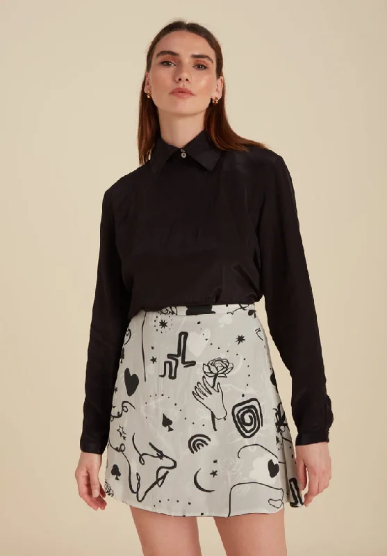 Sadie Flare Spellbound Print Mini Skirt In Black ruffled skirt detail