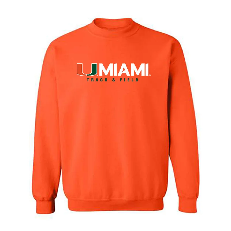 Miami - NCAA Women's Track & Field : Brittney Jennings - Classic Shersey Crewneck Sweatshirt Hoodie with Hem Detail Decorative Unique