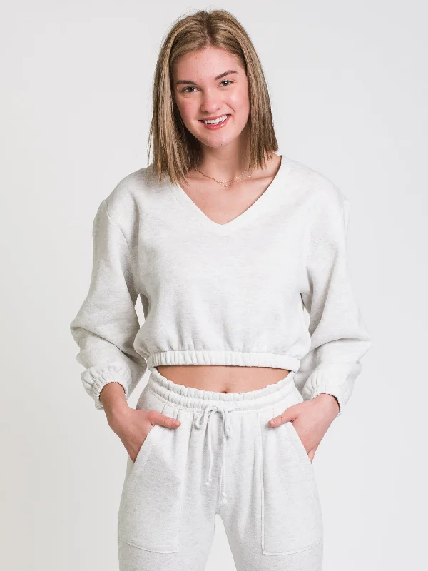 HARLOW KAILAH V-NECK SWEATSHIRT - CLEARANCE Hoodie with Hem Detail Decorative Unique